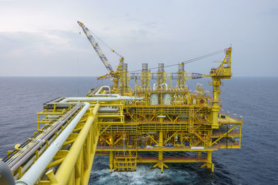 Oil and gas industry at offshore. daylight scene at oil and gas production platform complex.