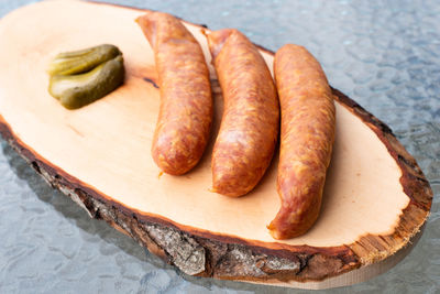 High angle view of bread on cutting board