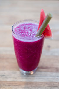 Close-up of drink on glass table