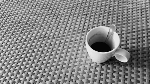 High angle view of coffee cup on table