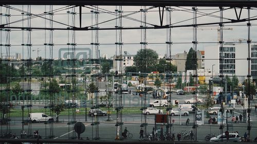 People in city against sky