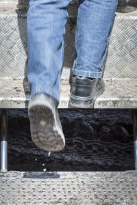 Low section of man walking outdoors