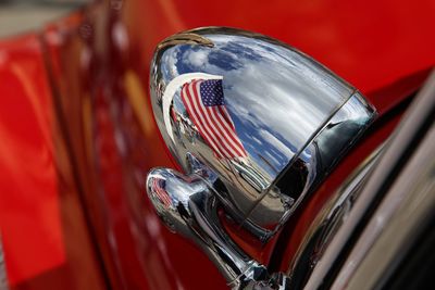 Close-up of red vintage car