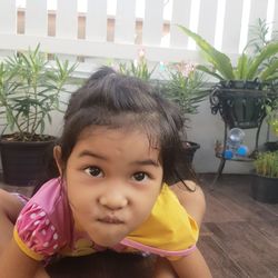 Portrait of cute girl at home