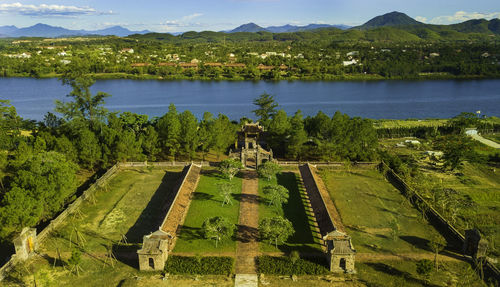 High angle view of plants and lake against sky