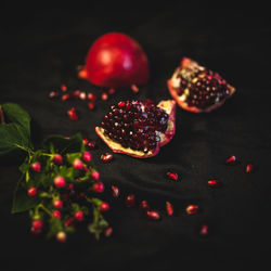 Close-up of strawberry over black background