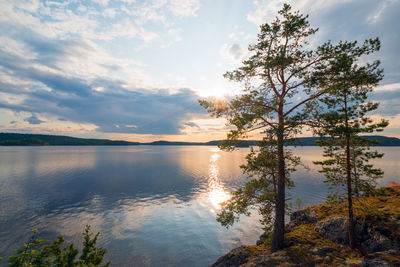 Scenic view of lake against sky during sunset