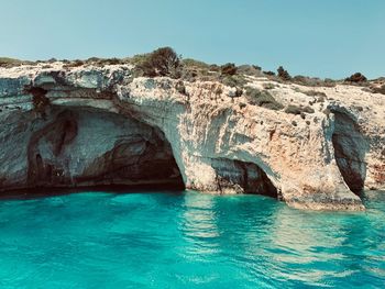 Scenic view of sea against clear blue sky