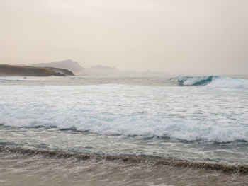 Scenic view of sea against clear sky