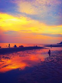 Scenic view of sea at sunset