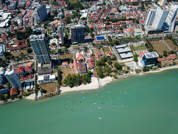 High angle view of buildings and houses in city