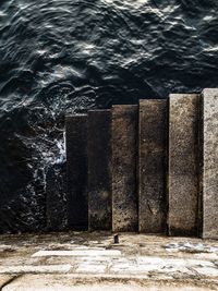 High angle view of steps by sea