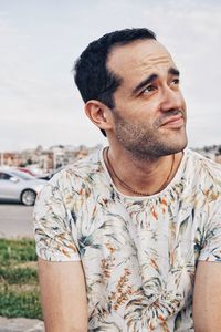 Portrait of young man looking away