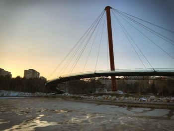 View of suspension bridge during winter