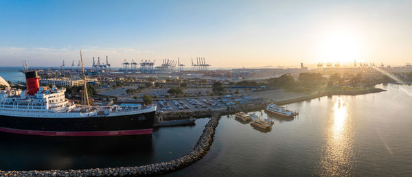 Boats moored at harbor