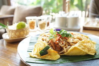 Close-up of food served on table