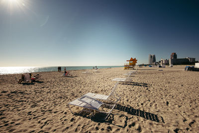 Scenic view of beach against clear sky