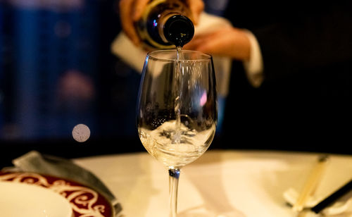 Close-up of wineglass on table