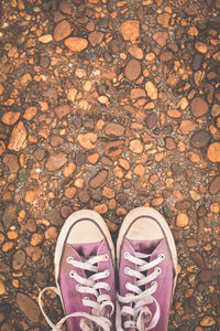 Pink canvas shoes outdoors