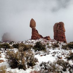 Scenic view of snow covered mountains