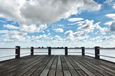 Pier over sea against sky