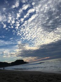 Scenic view of sea against sky at sunset