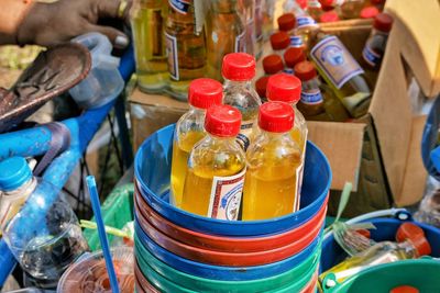Close-up of bottles in bowl stack