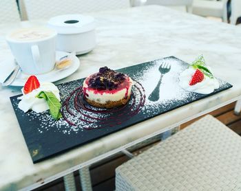 Dessert on slate over table