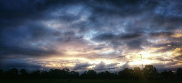 Scenic view of landscape against cloudy sky