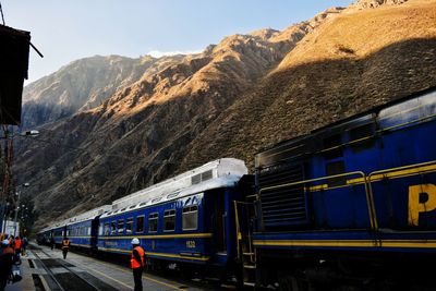Train on railroad track against sky