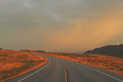 Road on landscape against sky