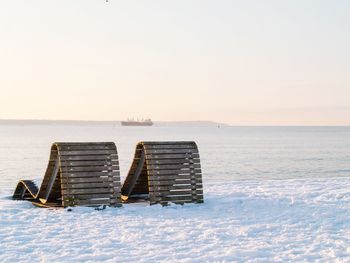 Scenic view of sea against clear sky during winter