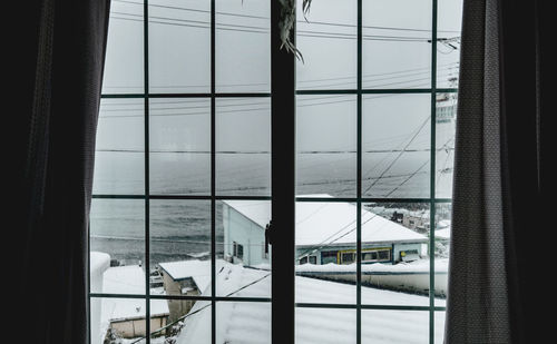 Sea seen through glass window