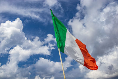 Low angle view of flag against sky