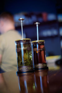 Close-up of beer glass on table