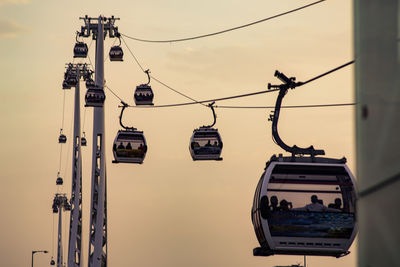 Overhead cable car against sky