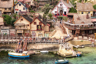 High angle view of townscape by canal