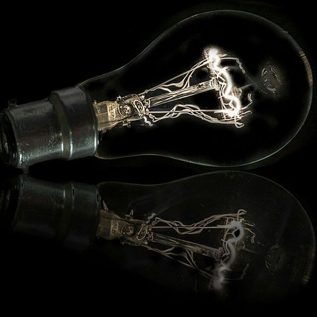 studio shot, black background, close-up, still life, indoors, night, metal, abstract, illuminated, glowing, art and craft, no people, dark, creativity, single object, art, man made object, ideas, electricity, black color