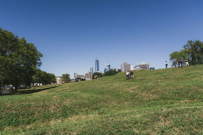 People in park against clear sky