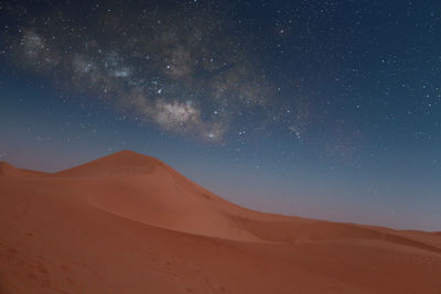 Scenic view of desert against sky