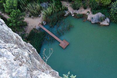 High angle view of rock by river