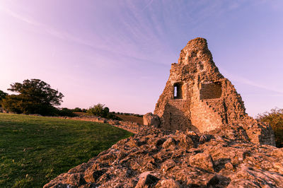 Old ruin building on field