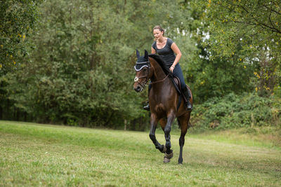 Man riding horse