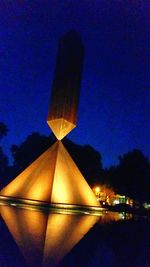 Low angle view of illuminated lamp post