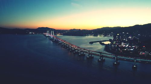 High angle view of gwangandaegyo bridge over river at sunset