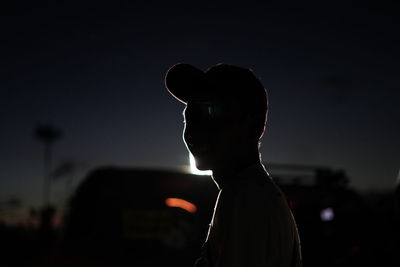 Portrait of silhouette man standing against sky during sunset