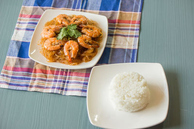 Thai food, baked shrimp, glass noodles with a plate of rice