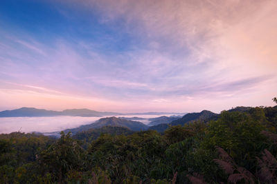 Scenic view of mountains against sky during sunset