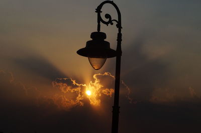 Street light against sky at night