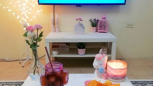 Flower vase on table at home